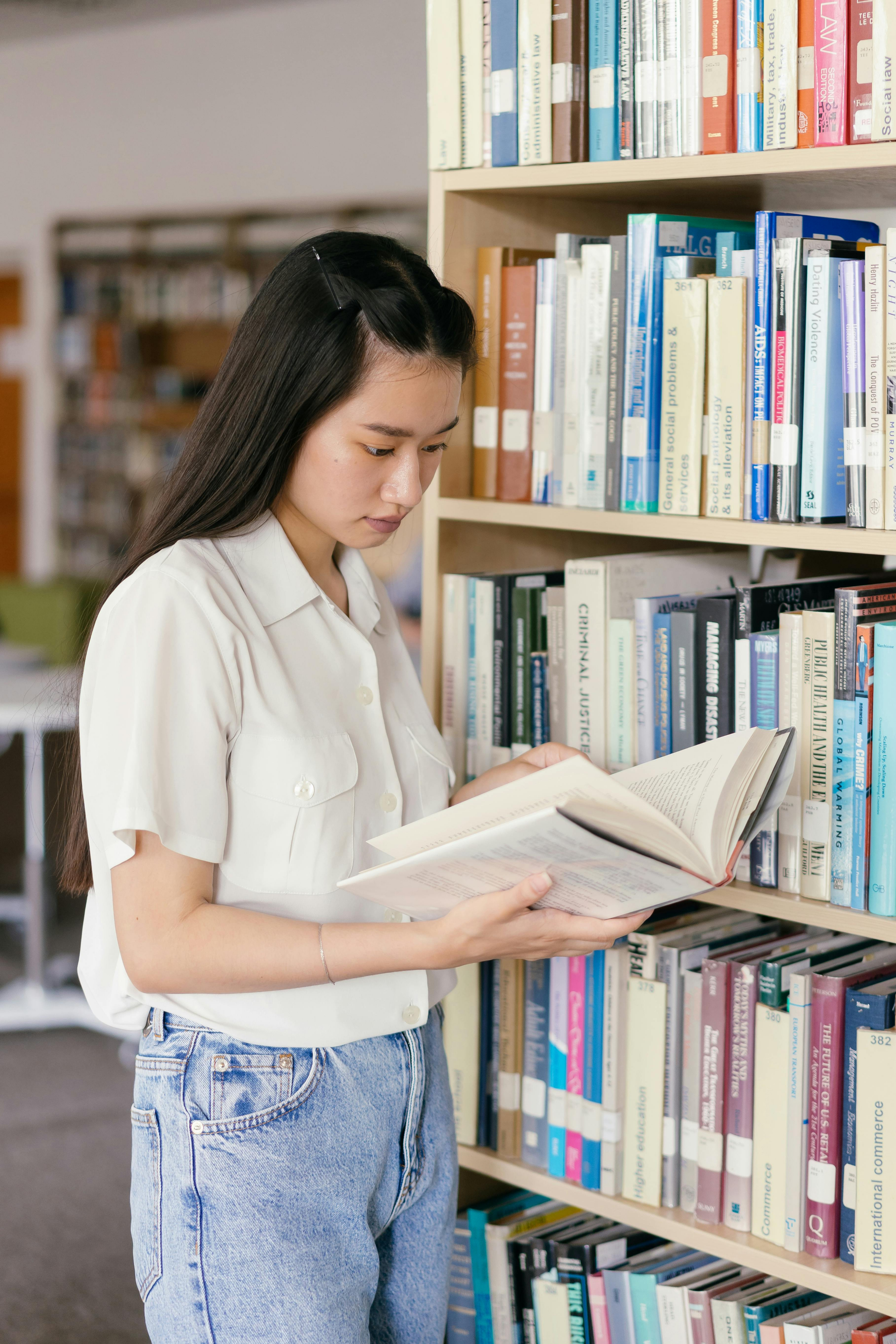 A girl reading in library
